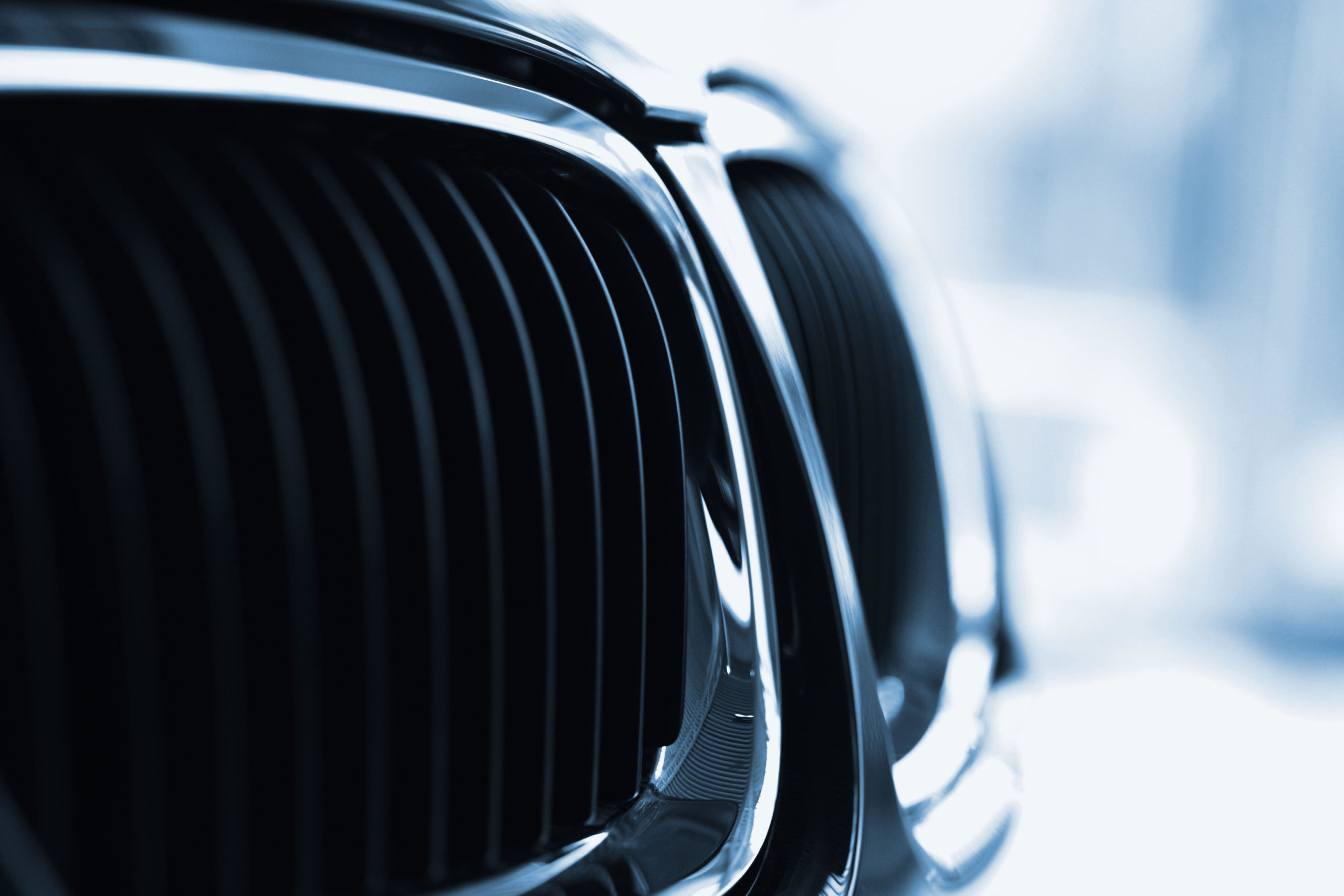 Close up of a black car grill
